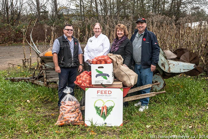 Jaymie Collins (General Manager, Vancouver Island Farm Products), Sandra Hamilton (FEED Comox Valley Project Lead), and Dawn McRae (Owner, Custom Gourmet loads a van with fresh produce that will be used at NIC in order to support local agriculture.