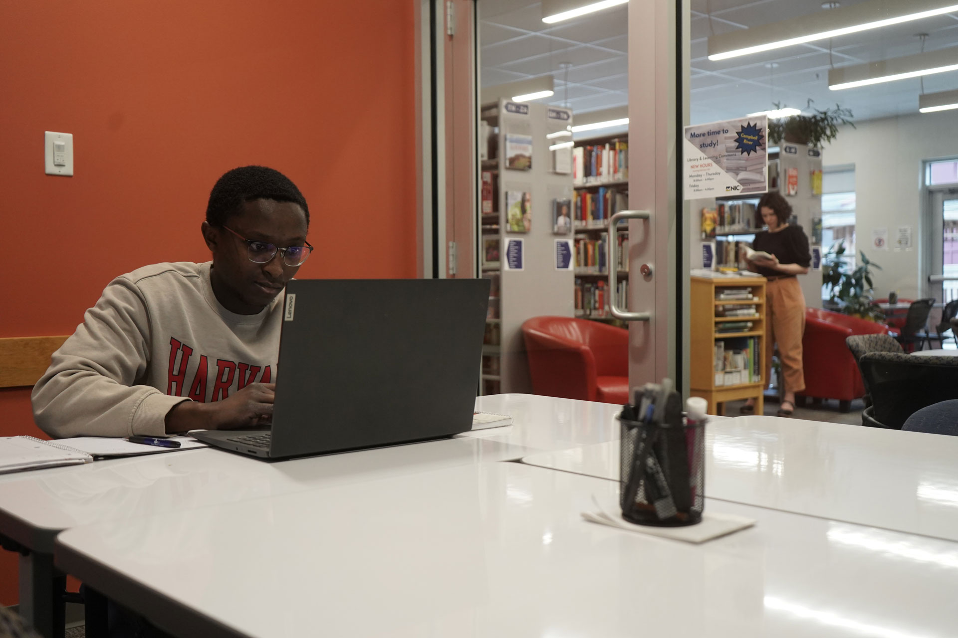 Student using a study space at the Campbell River campus library