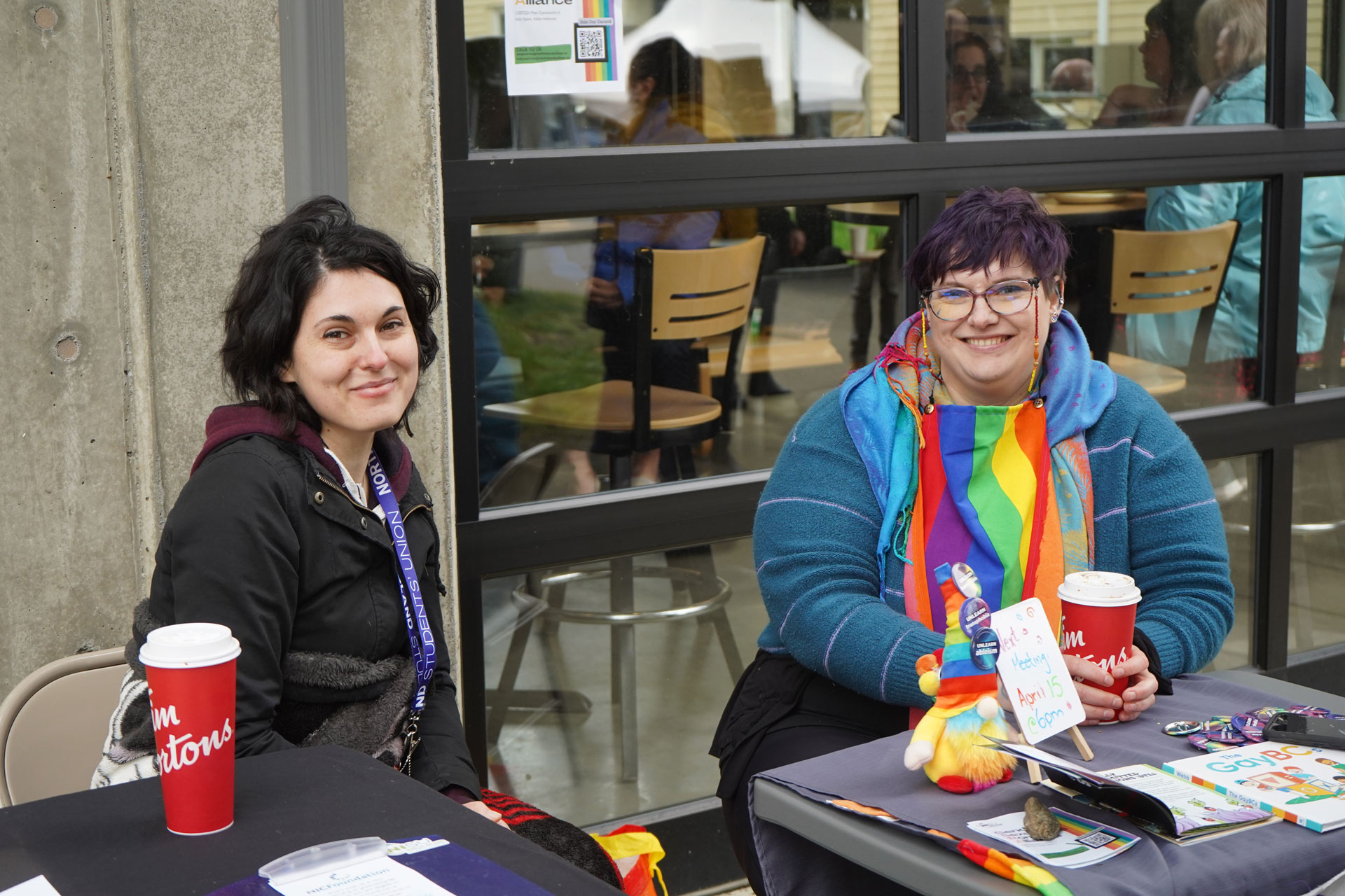 Members of the North Island Students' Union share a coffee at a NISU event