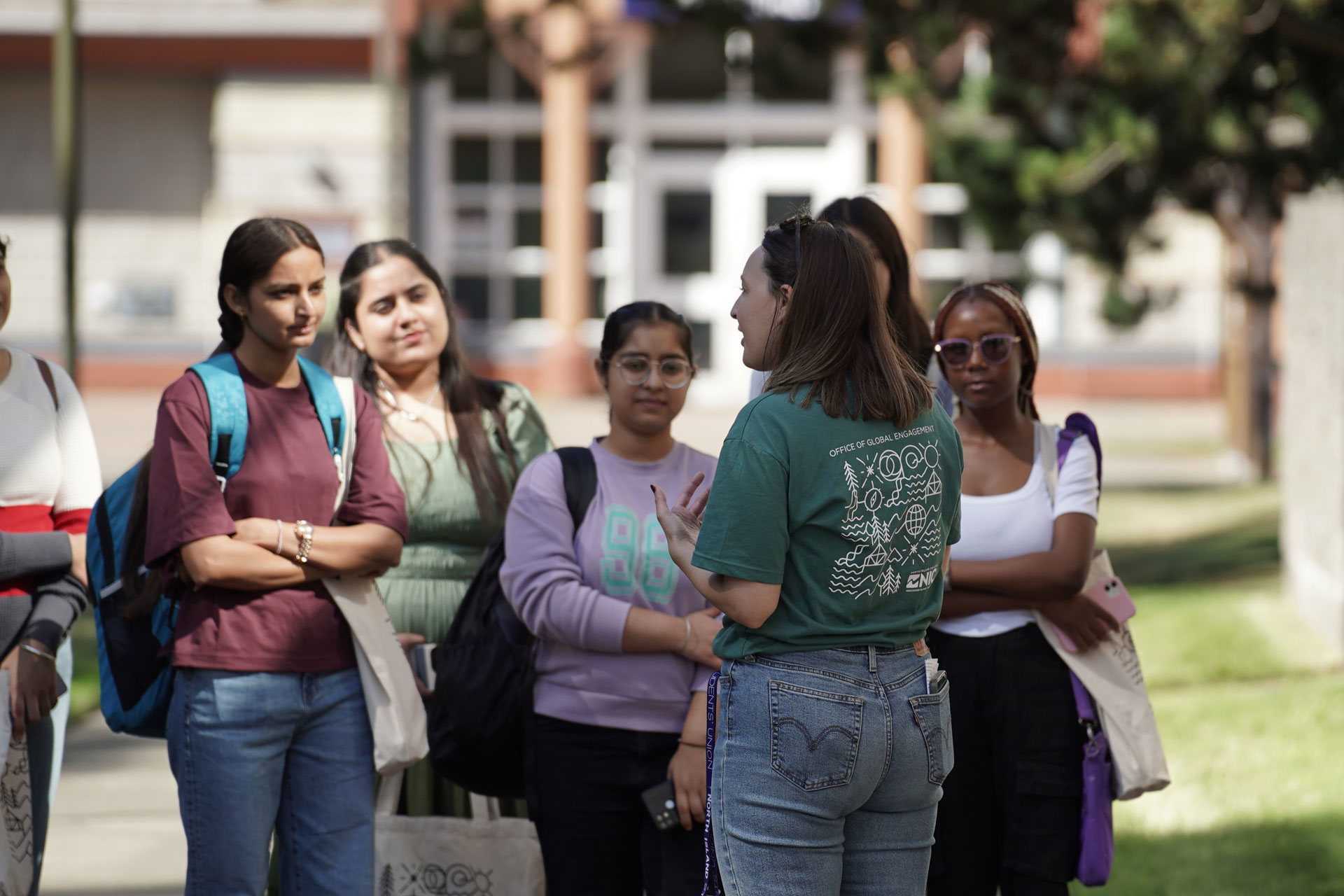 Students outside Komoux Hall at international Orientation event