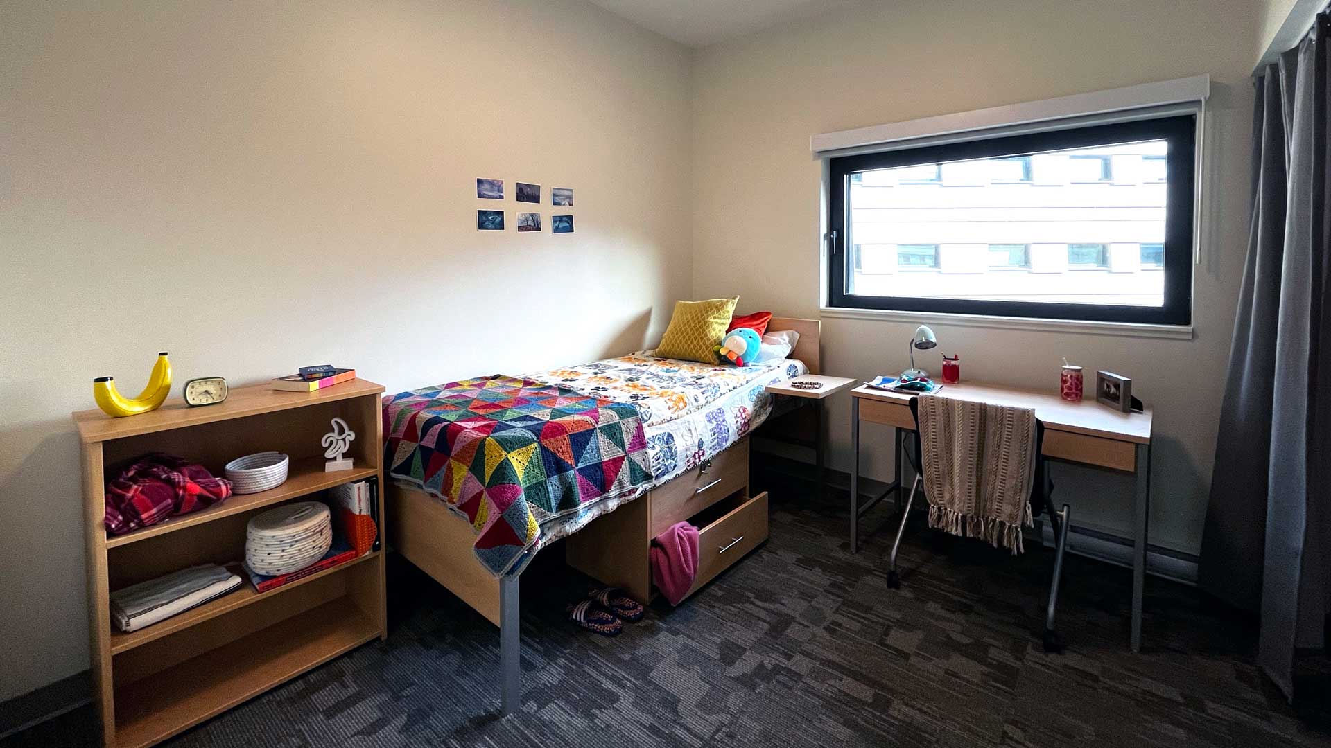 Bedroom of quad suite in tl'emstan building