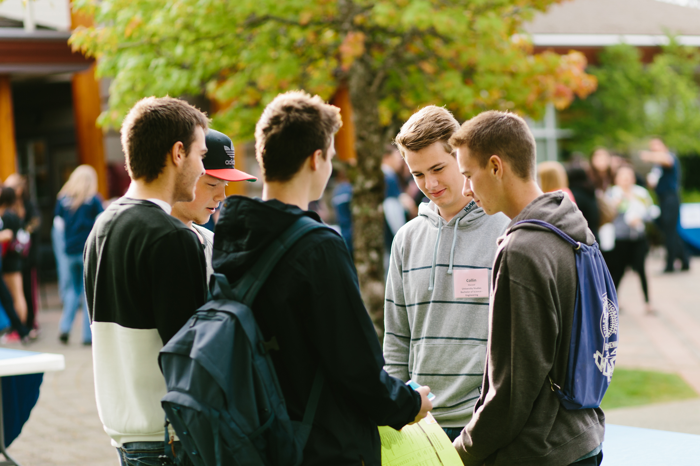 four students gathered at orientation event