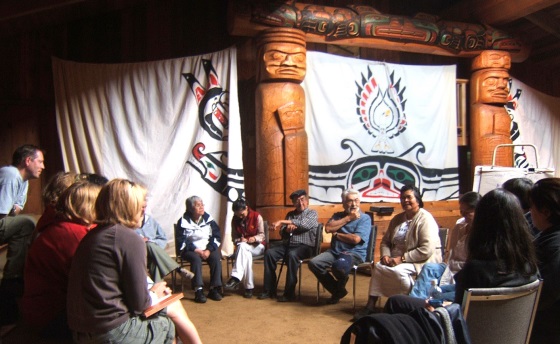 Nursing students and instructors gather in the big house with Indigenous community members, elders and leaders