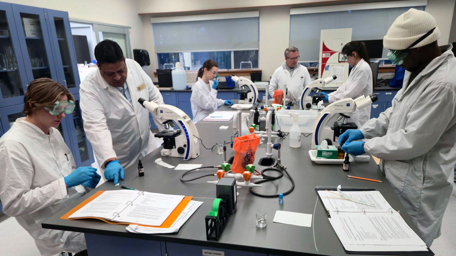 A researcher works for college biology students.