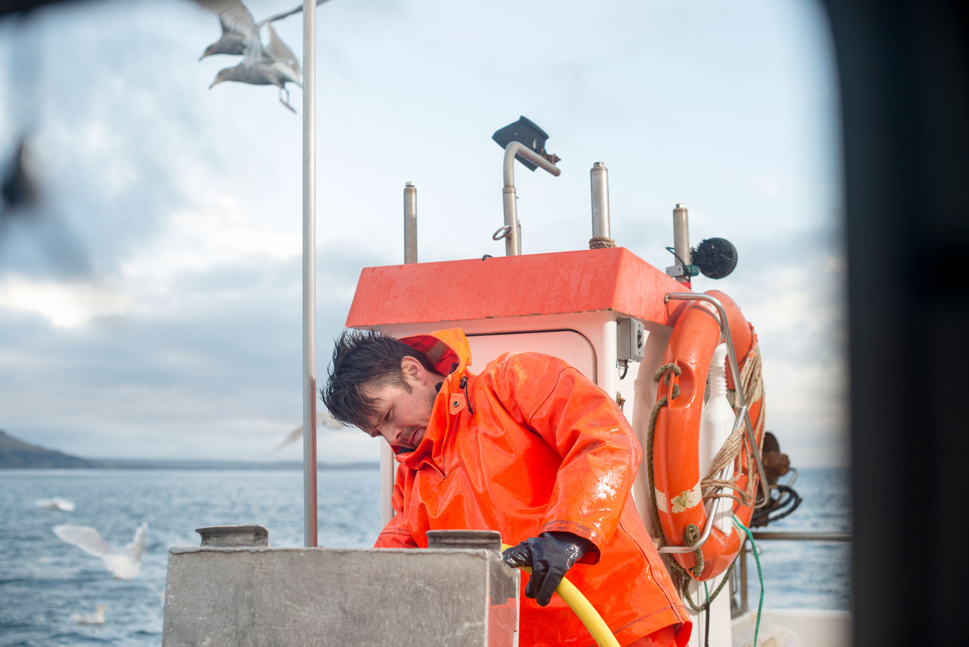 mariner working on a fishing boat