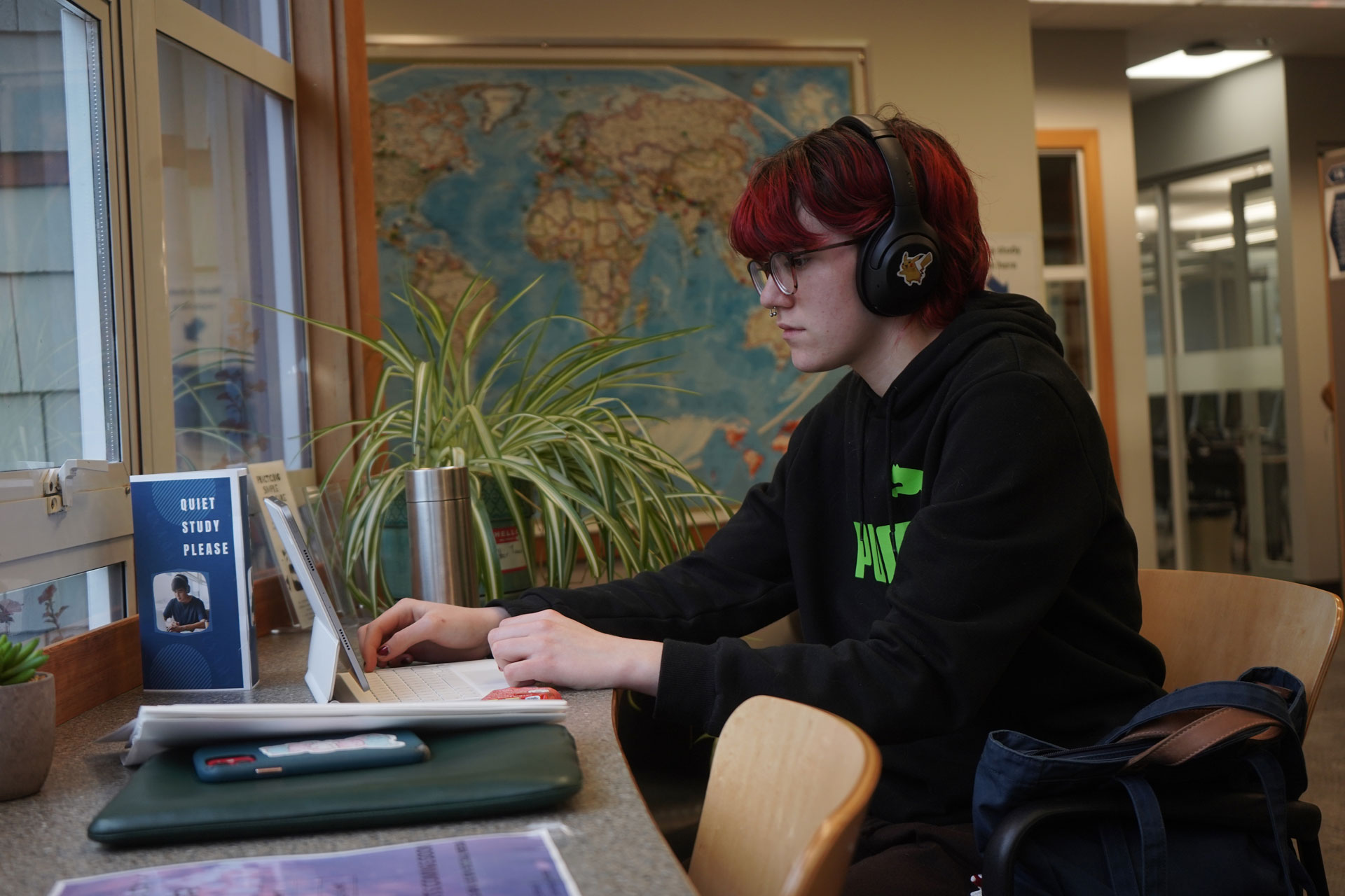 Student doing schoolwork in the Comox Valley campus library