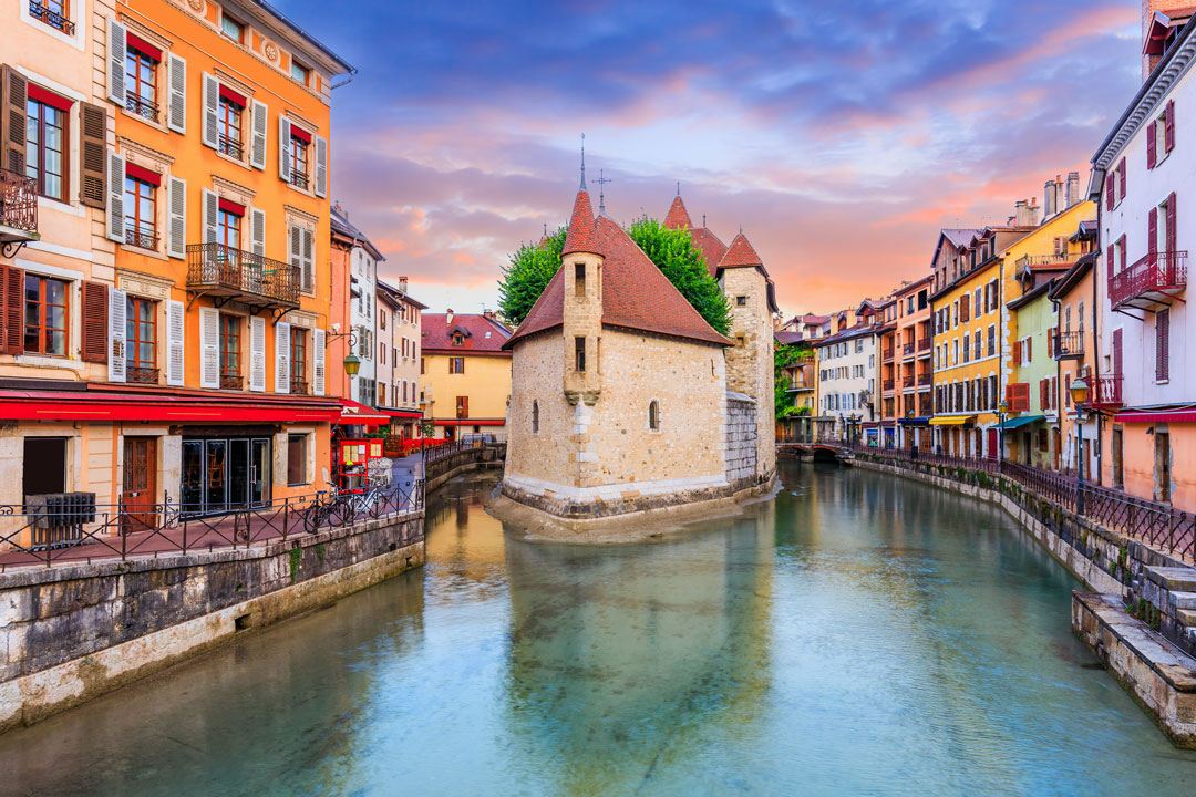 Annecy, Haute Savoie, France. The castle on an island (Palais de l'Isle) and Thiou river.